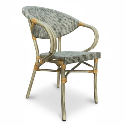 Bistro chair with grey and white woven seat and back, and a weathered frame with tan rattan accents for restaurant